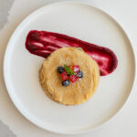 Pancakes With Maple Syrup, Powdered Sugar, Berry Compote